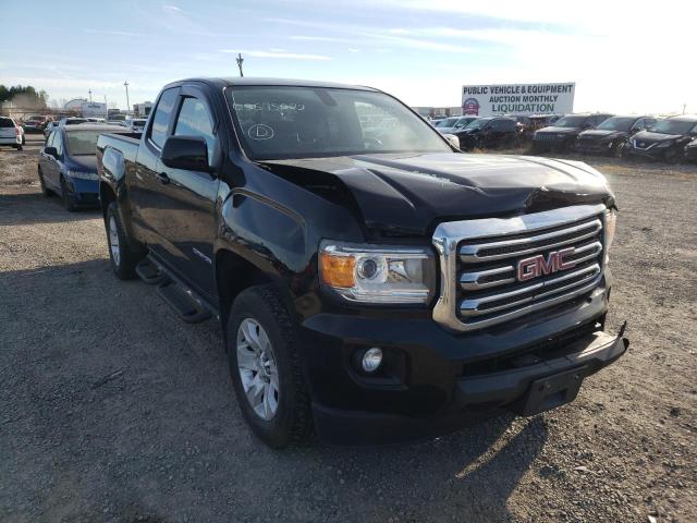 GMC CANYON SLE 2015 with VIN 1GTH5BE34F1231411 - Photo from auction