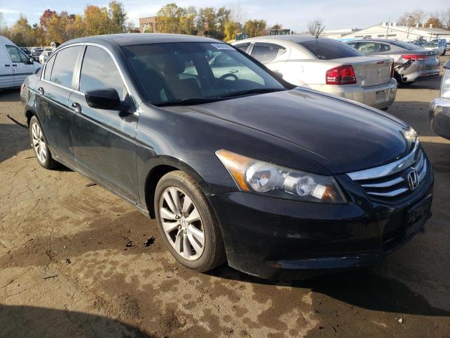 HONDA ACCORD EXL 2011 with VIN 1HGCP2F86BA138142 - Photo from auction