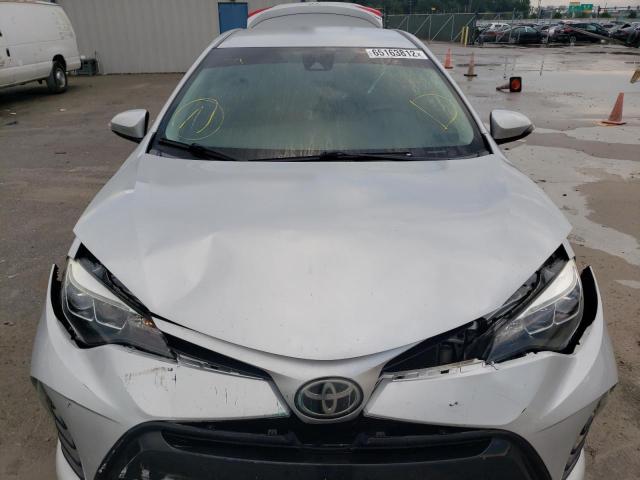 Photo 7 from auction – 2017 TOYOTA COROLLA L with VIN 5YFBURHE1HP672653