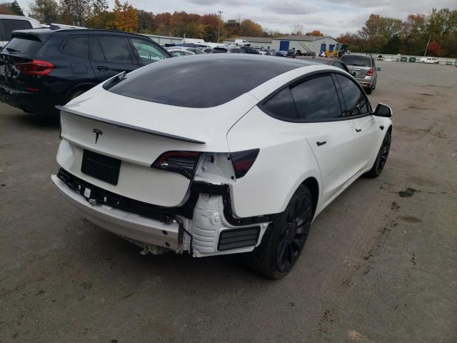 Photo 4 from auction – 2022 TESLA MODEL 3 with VIN 5YJ3E1EC0NF255229