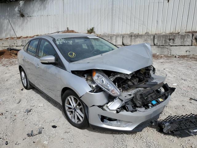 FORD FOCUS SE 2017 with VIN 1FADP3F20HL225879 - Photo from auction