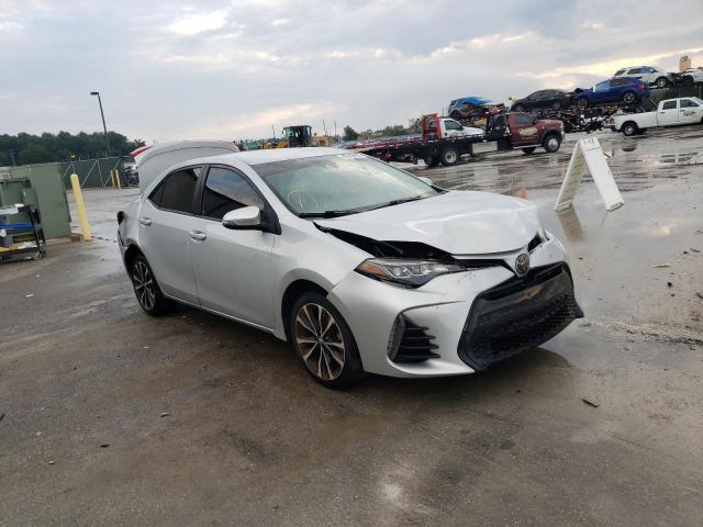 TOYOTA COROLLA L 2017 with VIN 5YFBURHE1HP672653 - Photo from auction
