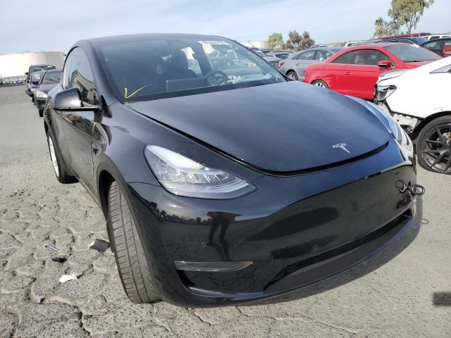 TESLA MODEL Y 2021 with VIN 5YJYGDEE3MF199515 - Photo from auction