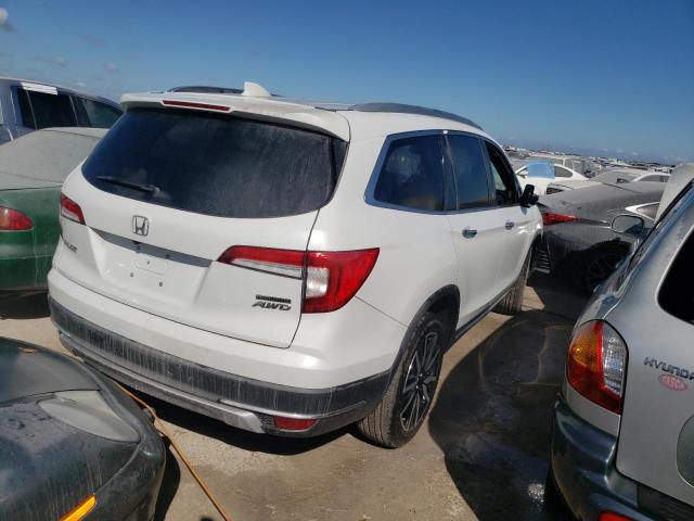 Photo 4 from auction – 2022 HONDA PILOT TOUR with VIN 5FNYF6H6XNB034288