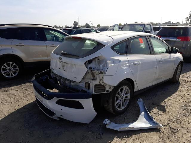 Photo 4 from auction – 2018 FORD FOCUS SE with VIN 1FADP3K22JL324182