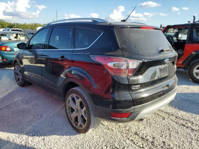 Photo 3 from auction – 2017 FORD ESCAPE TIT with VIN 1FMCU0J93HUA02792