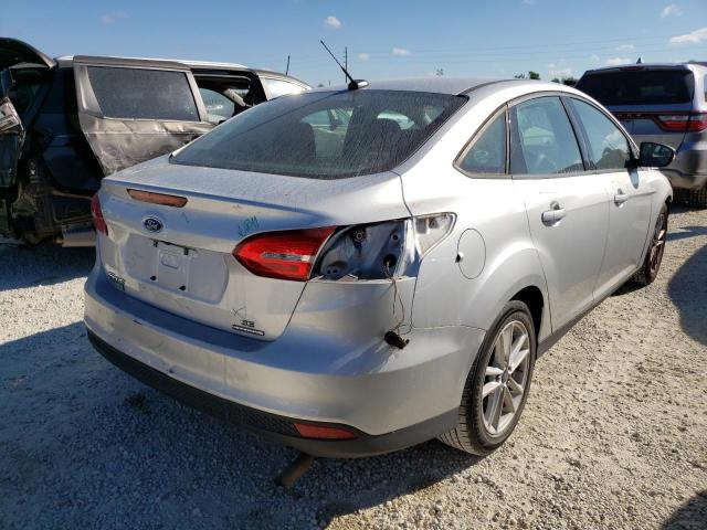 Photo 4 from auction – 2015 FORD FOCUS SE with VIN 1FADP3F28FL276527