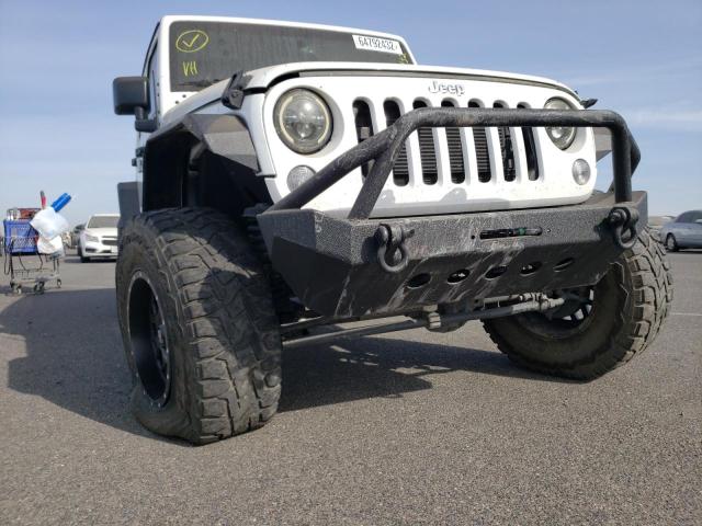 Photo 9 from auction – 2016 JEEP WRANGLER U with VIN 1C4BJWDG1GL129406