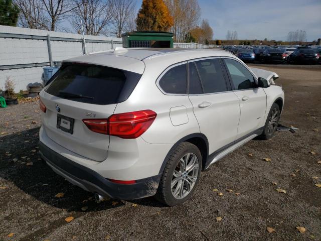 Photo 4 from auction – 2016 BMW X1 XDRIVE2 with VIN WBXHT3C34G5F65663