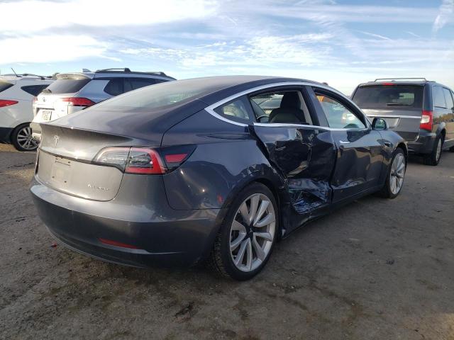 Photo 4 from auction – 2018 TESLA MODEL 3 with VIN 5YJ3E1EB0JF121306