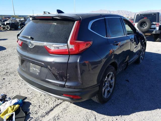 Photo 4 from auction – 2017 HONDA CR-V EXL with VIN 7FARW1H85HE024141