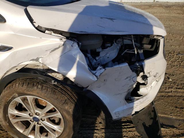 Photo 9 from auction – 2018 FORD ESCAPE SE with VIN 1FMCU9GD0JUC11512