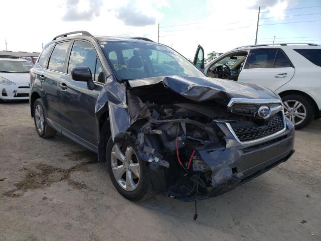 SUBARU FORESTER 2 2014 with VIN JF2SJAHC0EH498737 - Photo from auction