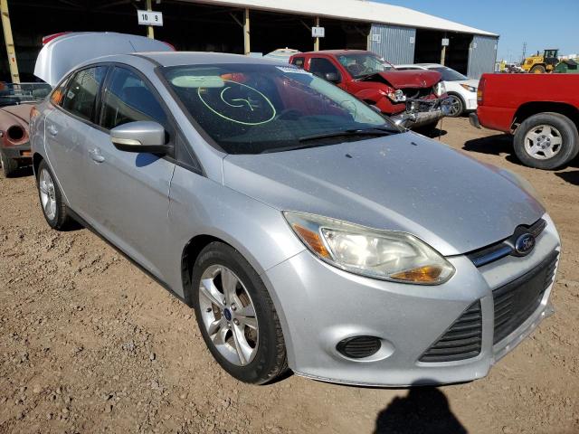 FORD FOCUS SE 2014 with VIN 1FADP3F21EL200727 - Photo from auction