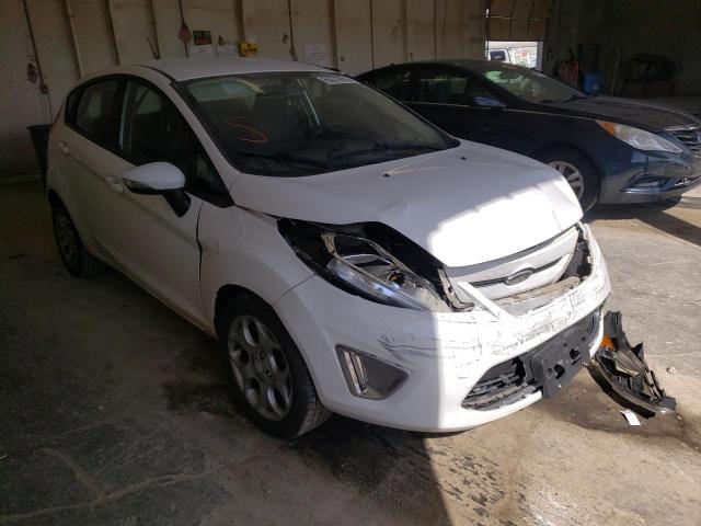 FORD FIESTA SES 2011 with VIN 3FADP4FJ5BM207848 - Photo from auction
