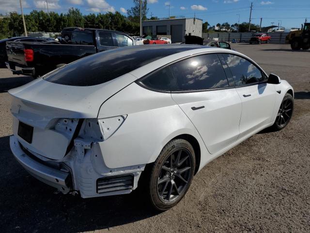 Photo 4 from auction – 2021 TESLA MODEL 3 with VIN 5YJ3E1EA5MF907890