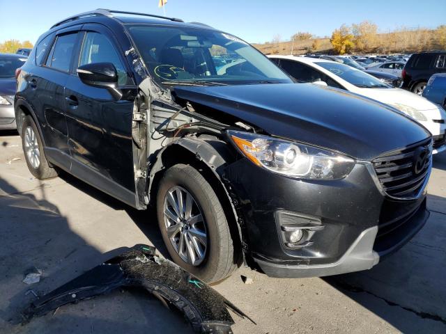 MAZDA CX-5 TOURI 2016 with VIN JM3KE4CY9G0857499 - Photo from auction