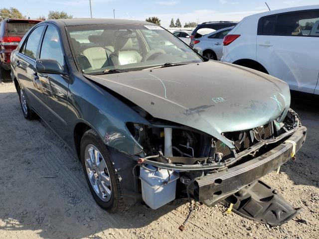 TOYOTA CAMRY LE 2005 with VIN 4T1BF30KX5U081966 - Photo from auction