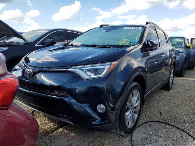 Photo 2 from auction – 2018 TOYOTA RAV4 LIMIT with VIN 2T3YFREV7JW482182
