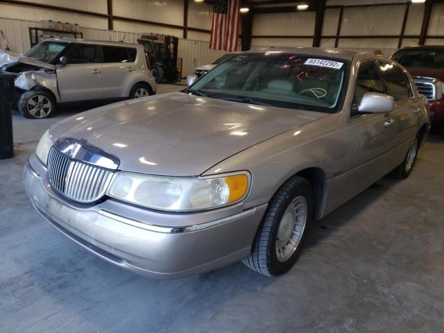 Photo 2 from auction – 2000 LINCOLN TOWN CAR E with VIN 1LNHM81W4YY805632