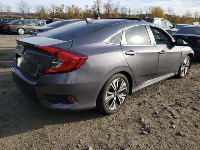 Photo 4 from auction – 2017 HONDA CIVIC EXL with VIN 2HGFC1F75HH641519