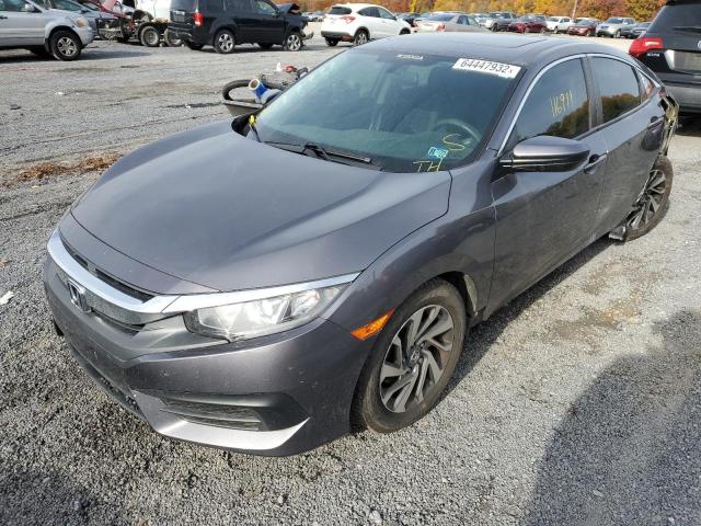 Photo 2 from auction – 2017 HONDA CIVIC EX with VIN 2HGFC2F76HH542990