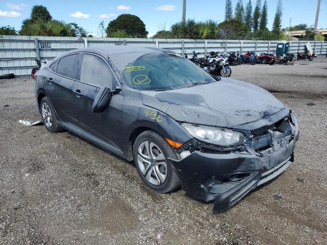 HONDA CIVIC LX 2018 with VIN 19XFC2F53JE037634 - Photo from auction