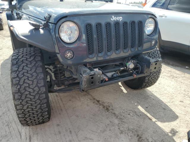 Photo 9 from auction – 2016 JEEP WRANGLER U with VIN 1C4BJWFG6GL191557