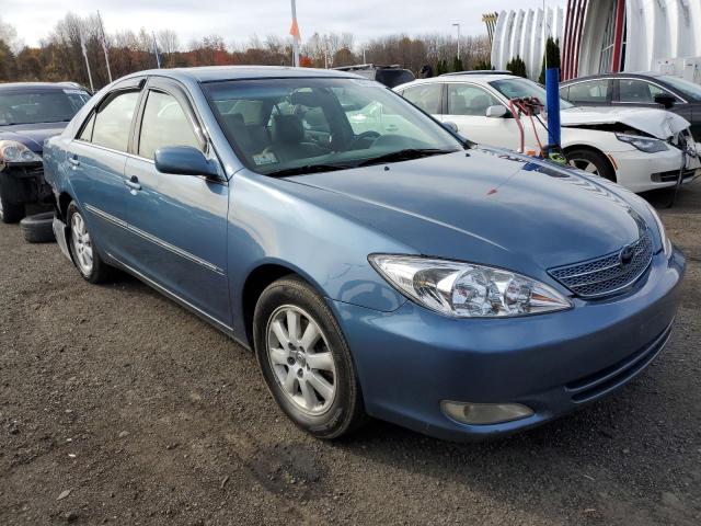 TOYOTA CAMRY LE 2003 with VIN 4T1BF30K83U558293 - Photo from auction