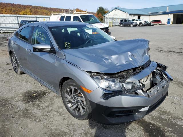 HONDA CIVIC EX 2018 with VIN 2HGFC2F7XJH556400 - Photo from auction
