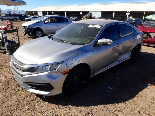 HONDA CIVIC LX 2018 with VIN 19XFC2F53JE018730 - Photo from auction