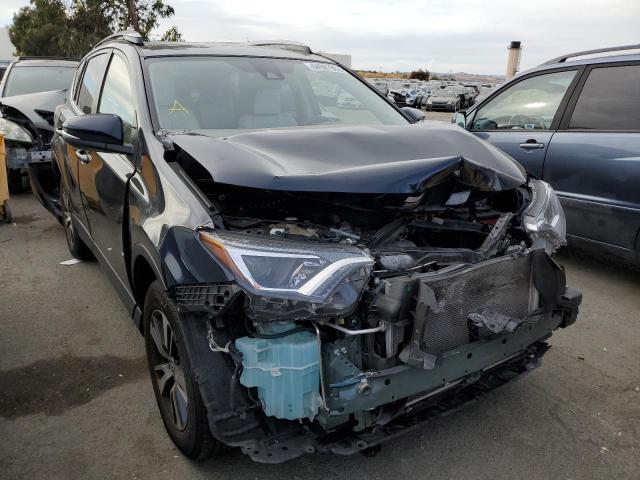 Photo 1 from auction – 2017 TOYOTA RAV4 XLE with VIN JTMRFREV4HJ705193