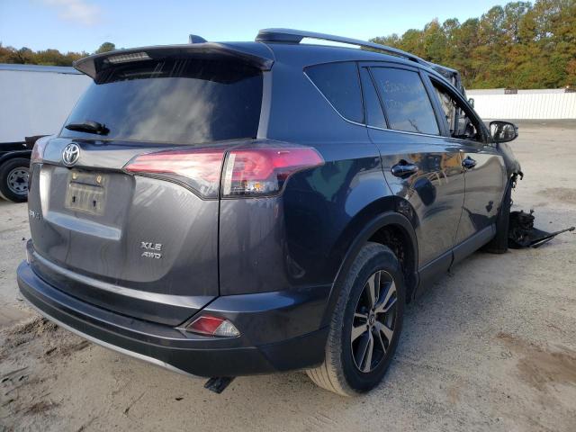 Photo 4 from auction – 2017 TOYOTA RAV4 XLE with VIN JTMRFREV8HD212017