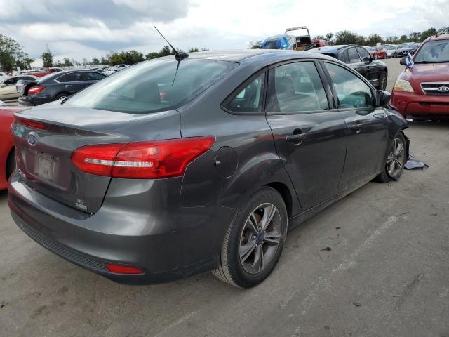Foto 4 de la subasta – 2018 FORD FOCUS SE con VIN 1FADP3FE5JL209371