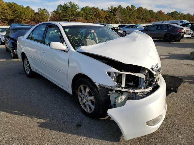 TOYOTA CAMRY LE 2004 with VIN JTDBE32K540285262 - Photo from auction