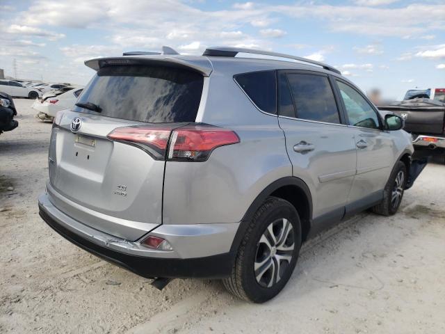 Photo 3 from auction – 2018 TOYOTA RAV4 LE with VIN 2T3BFREV0JW848036