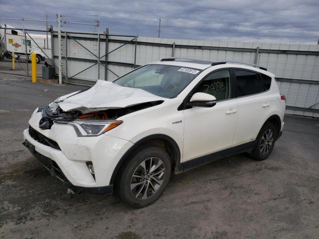 Photo 2 from auction – 2017 TOYOTA RAV4 HV with VIN JTMRJREV0HD147761