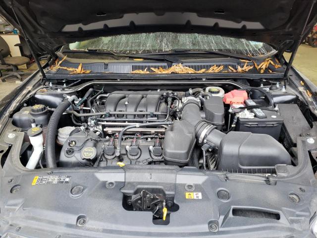 Photo 7 from auction – 2015 FORD TAURUS SE with VIN 1FAHP2D89FG100274