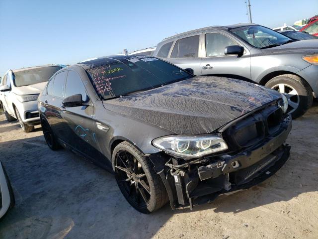 BMW M5 2014 with VIN WBSFV9C57ED593355 - Photo from auction