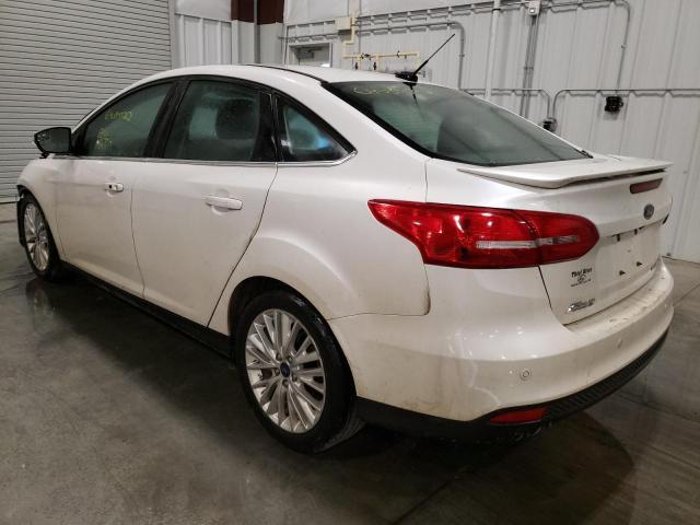 Photo 3 from auction – 2017 FORD FOCUS TITA with VIN 1FADP3J23HL325059