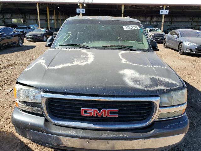 Photo 9 from auction – 2003 GMC YUKON with VIN 1GKEC13V03J310954