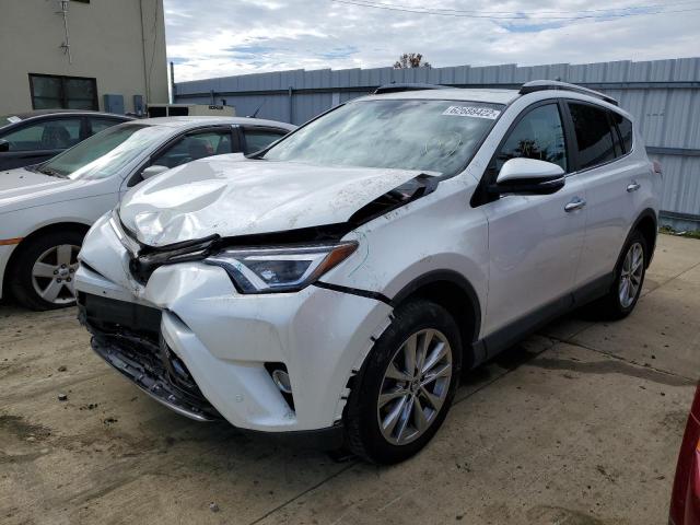 Photo 2 from auction – 2017 TOYOTA RAV4 LIMIT with VIN 2T3DFREV8HW539949