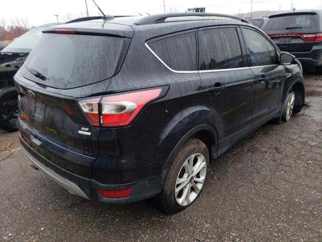 Photo 4 from auction – 2017 FORD ESCAPE SE with VIN 1FMCU0GD1HUD51302