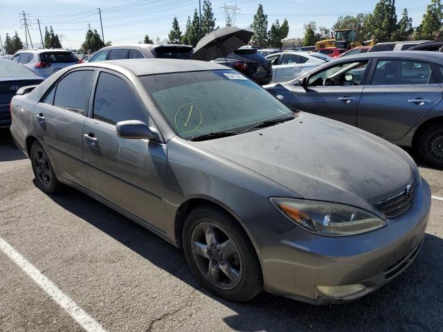 Photo 4 from auction – 2002 TOYOTA CAMRY LE with VIN JTDBE32K920022012