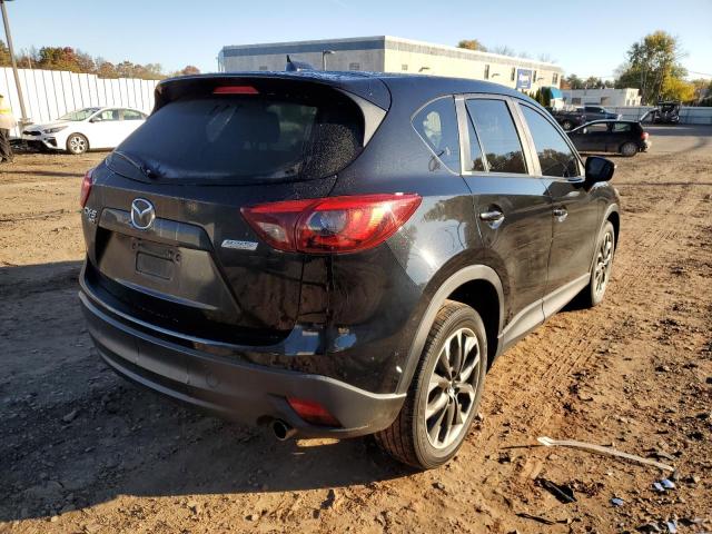 Photo 4 from auction – 2016 MAZDA CX-5 GT with VIN JM3KE4DY1G0755192