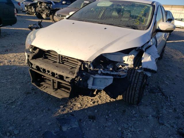 Photo 9 from auction – 2013 FORD FOCUS SE with VIN 1FADP3F29DL315624