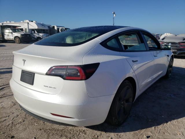 Photo 4 from auction – 2021 TESLA MODEL 3 with VIN 5YJ3E1EB3MF059694
