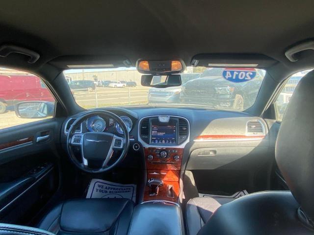 Photo 9 from auction – 2014 CHRYSLER 300 with VIN 2C3CCARG7EH323236