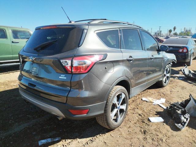 Photo 4 from auction – 2017 FORD ESCAPE SE with VIN 1FMCU0G93HUE57777