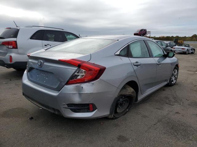 Photo 4 from auction – 2018 HONDA CIVIC LX with VIN 19XFC2F56JE201040